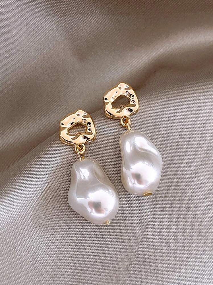 Pendientes con diseño de perlas barrocas dorado
